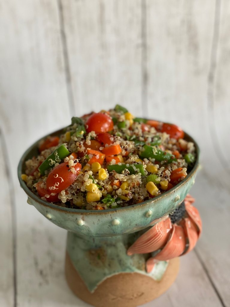 Chilled Quinoa Salad with mixed vegetables. Perfect for meal prep or a pot luck dinner.