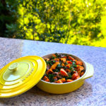 serving dish of sweet potatoes and kale