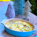 Casserole dish filled with scalloped potatoes