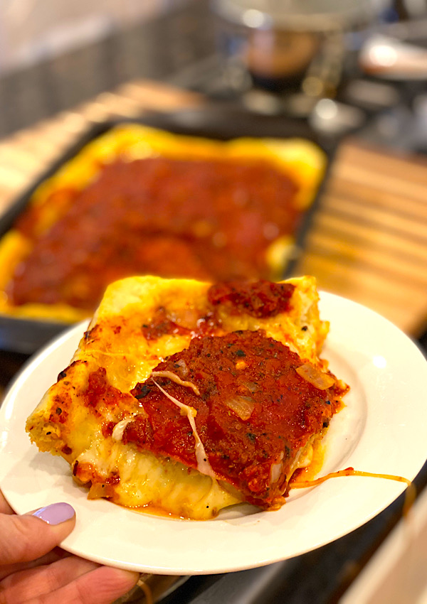 Cake Pan Deep Dish Pizza sliced and ready for dinner