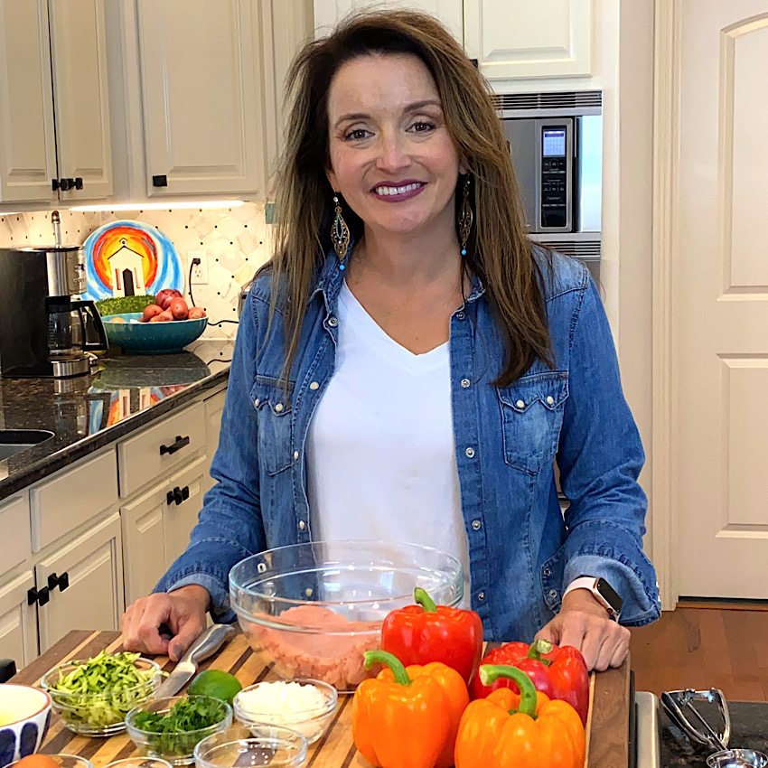 Lara with all the ingredients to make Southwest Stuffed Peppers