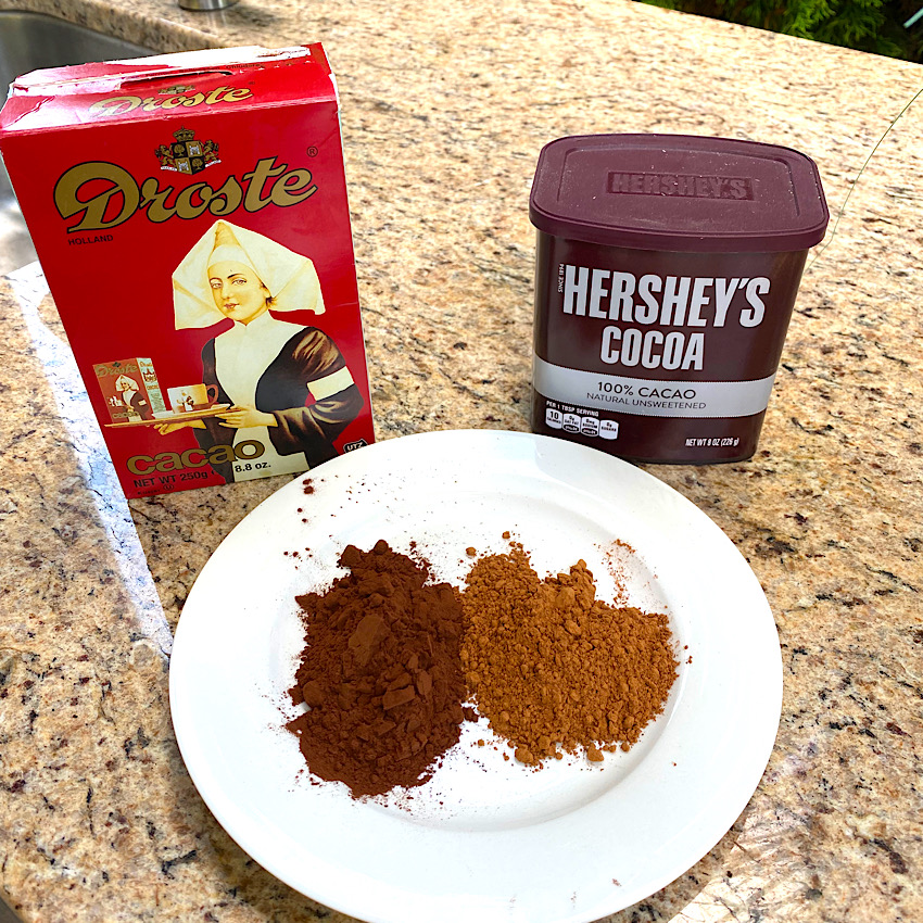 A photo showing how much darker Dutch cocoa is than traditional cocoa is.  This creates a much more dramatic flavor in your desserts