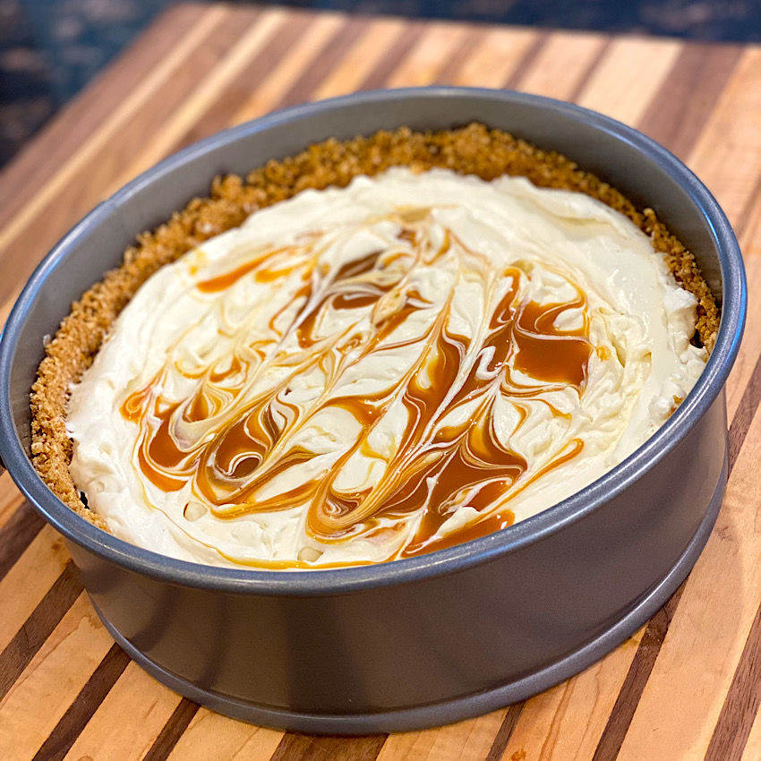 Salted Caramel No-Bake Cheesecake w/ Cinnamon Toast Crunch Crust chilled and ready to remove the pan