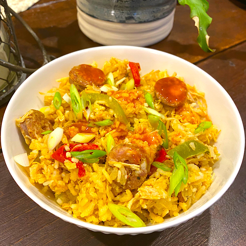 Hot bowl of Cajun Dirty Rice w/ Chicken and Andouille Sausage