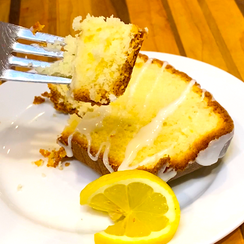 Bite of fresh lemon bread on a fork