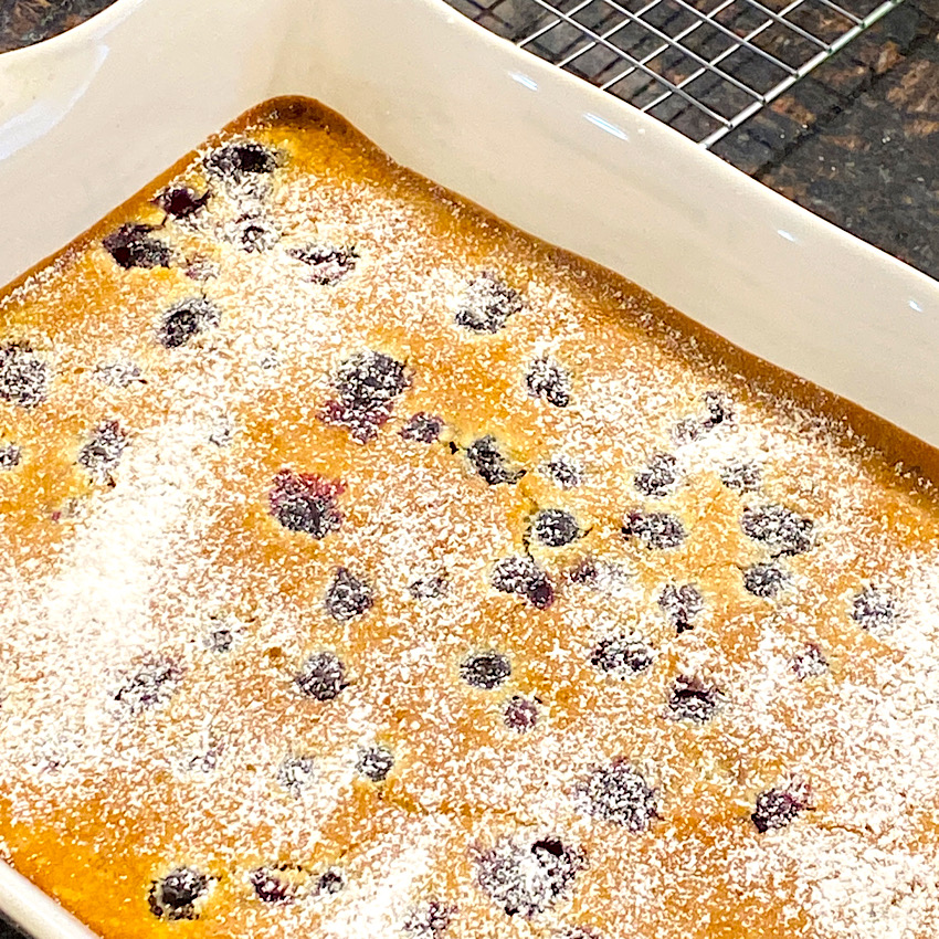 Lemon Blueberry Bars fresh from the oven. Dusted with powdered sugar.