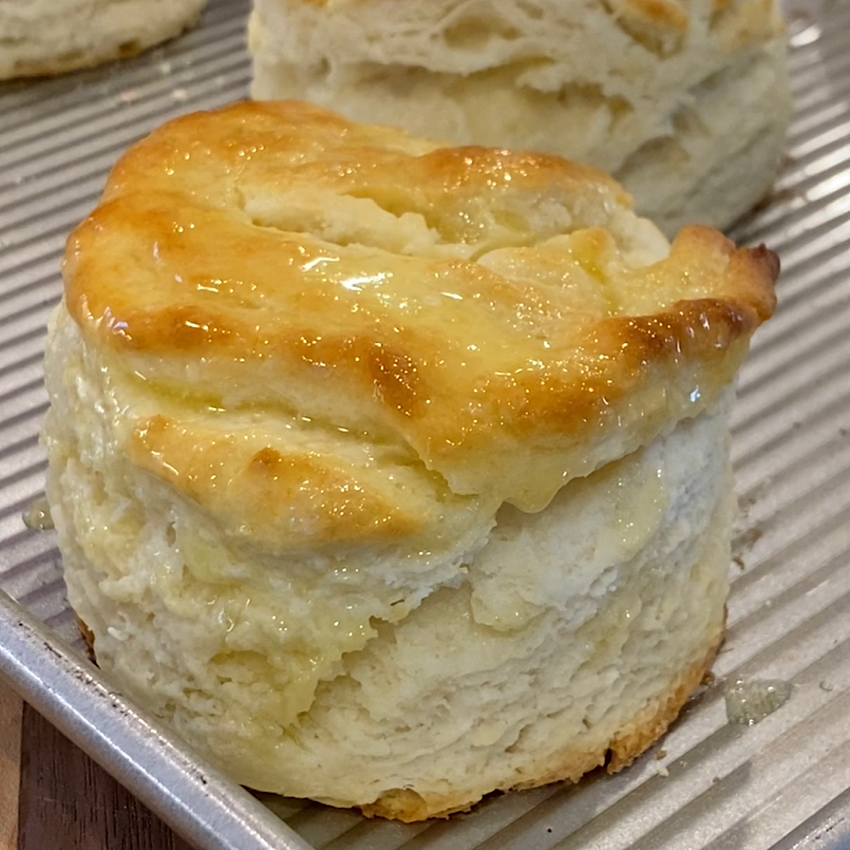 Warm butter brushed over a hot biscuit